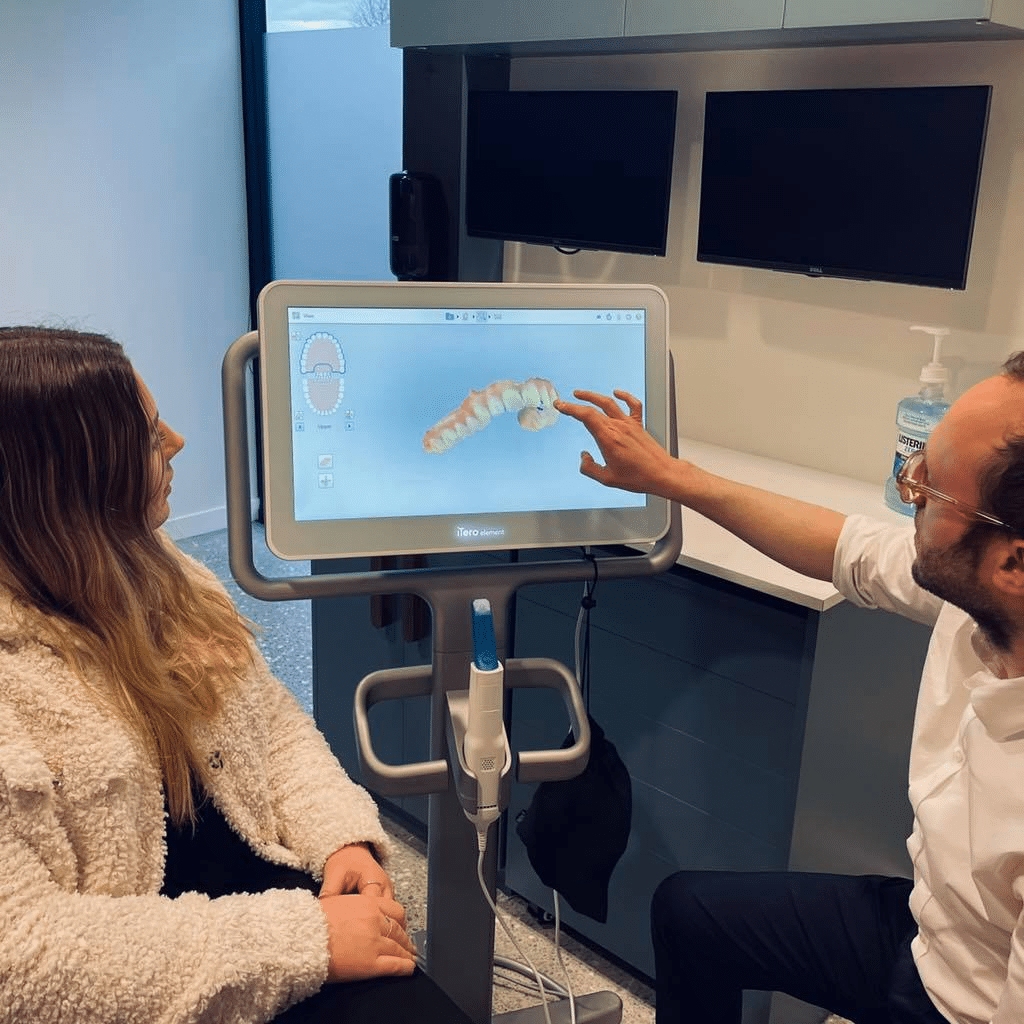 Orthodontist Dr John Perry explaining 3D scans for treatment planning for braces patient